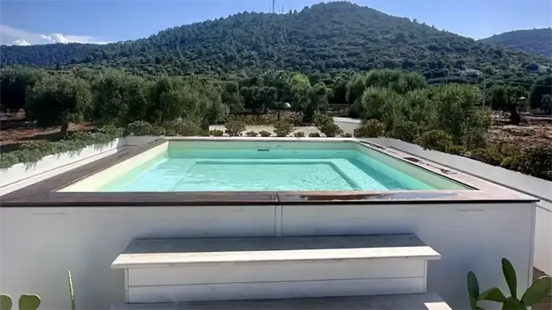 REBEA TRULLI HOME - area relax bordo piscina - Baires Piscine