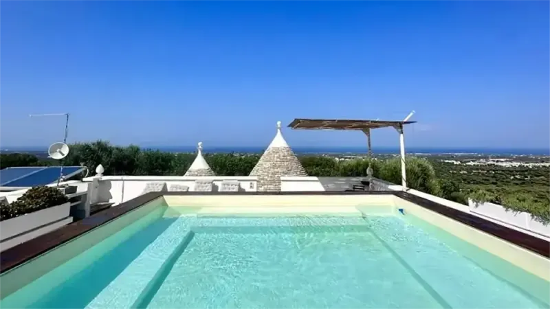 REBEA TRULLI HOME - area relax bordo piscina - Baires Piscine
