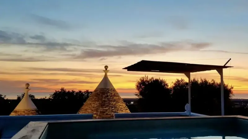 REBEA TRULLI HOME - area relax bordo piscina - Baires Piscine